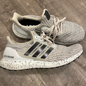 New, never worn, mens size 9 Adidas’s Ultra Boost running sneakers.